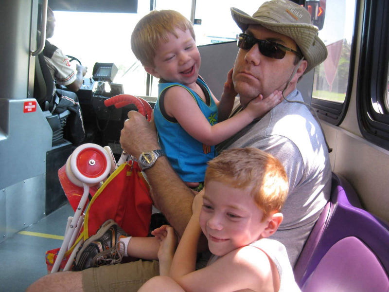 Photo of David Brodosi family and his two sons. Traveling to Disney.