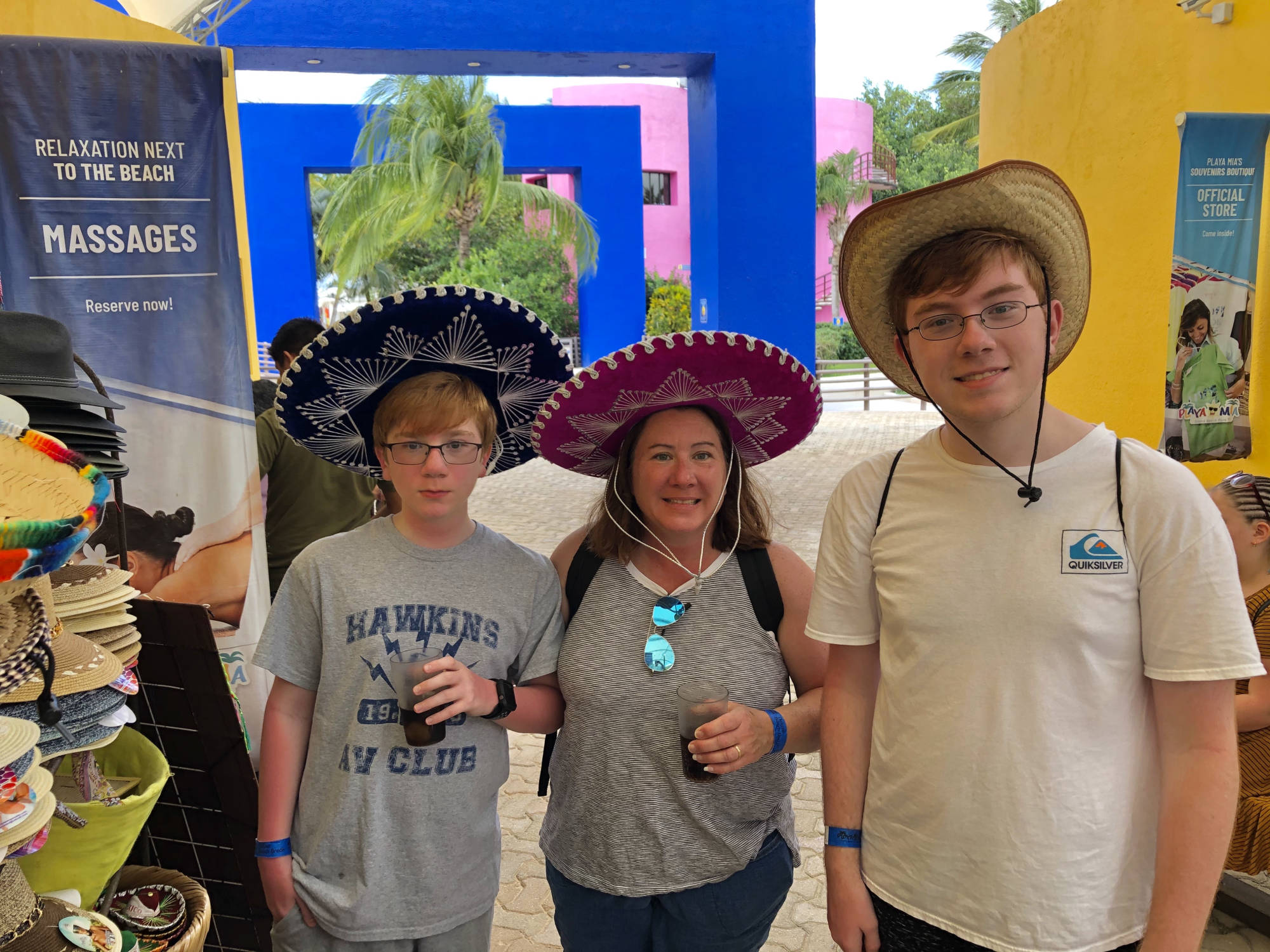 Brodosi family trying on hats in mexico