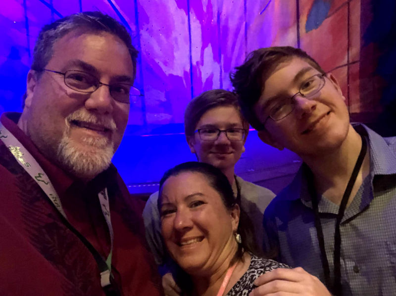 Photo of David Brodosi and his family taking in a show while traveling.